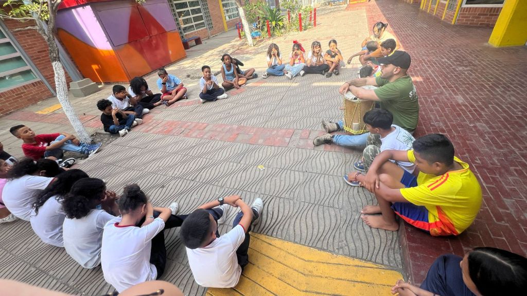 children participating in nurturing touch workshop colombia